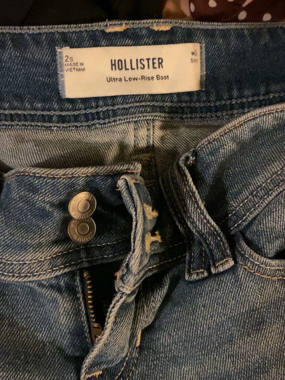 Hollister Women's Ultra Low-Rise Bootcut Jeans in Medium Blue